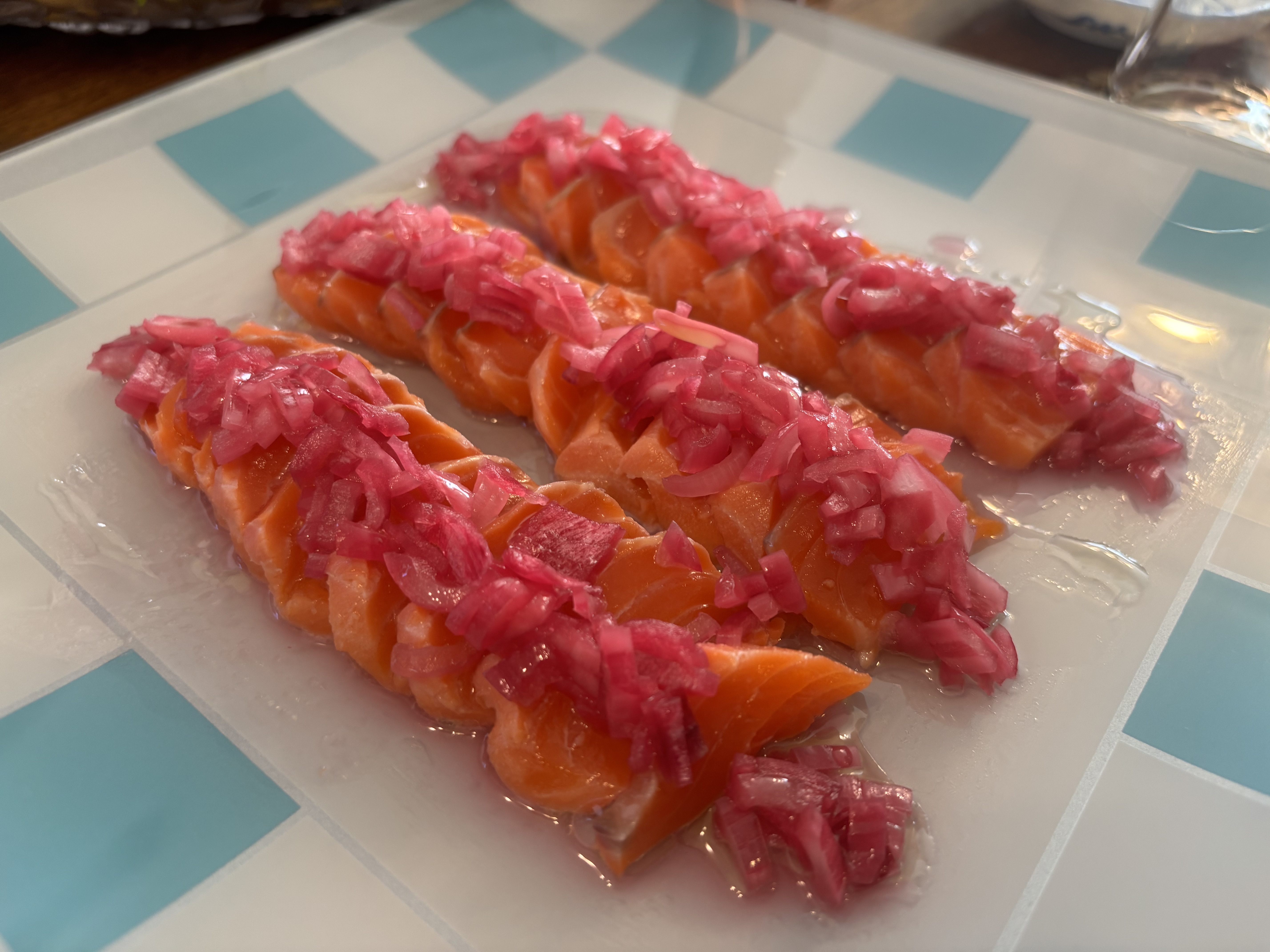 Salmon with pickled onion